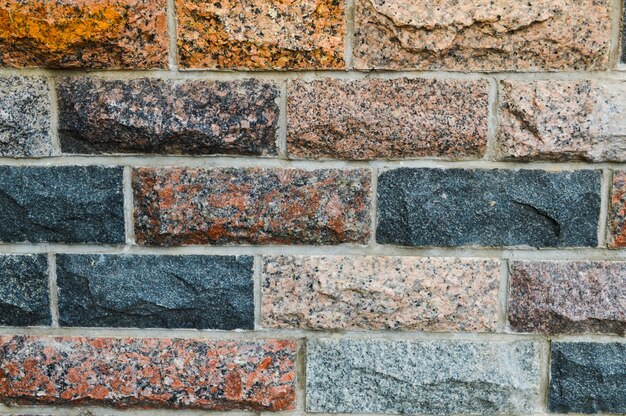 Texture of beautiful multicolored rectangular bricks tiles from natural marble and granite chips