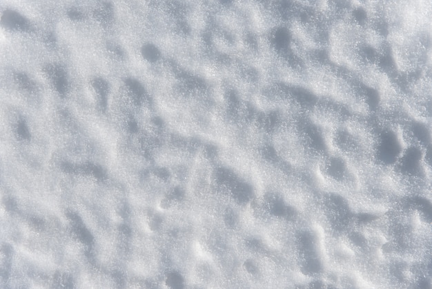 Texture of beautiful white snow in the afternoon