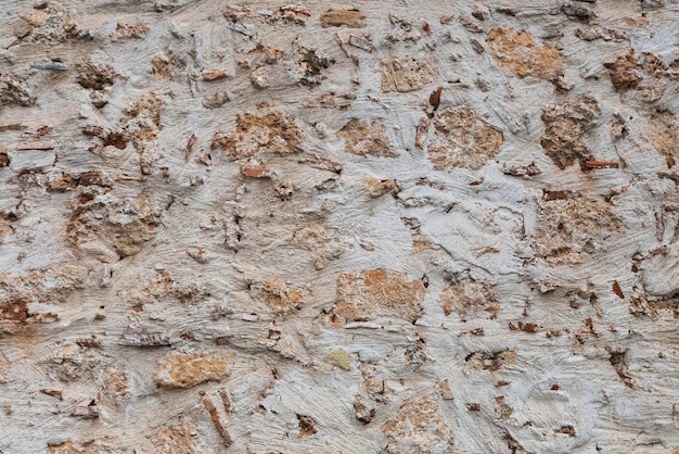 The texture of the beige stone wall Background texture of the stone wall