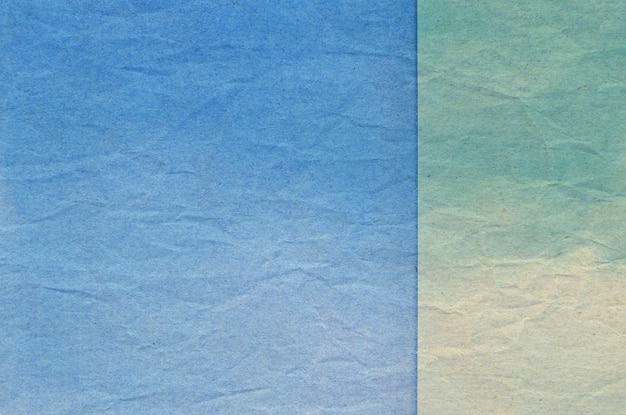 Photo texture of blue and green crumpled paper