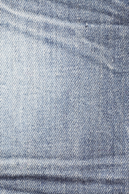 Texture of blue jeans close up.