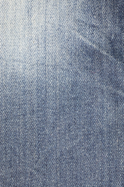 Texture of blue jeans close up.