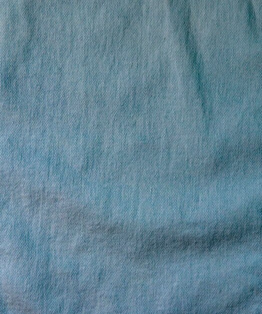 texture of blue jeans fabric. background