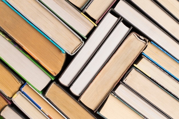 Photo texture of the book are stacked at an angle