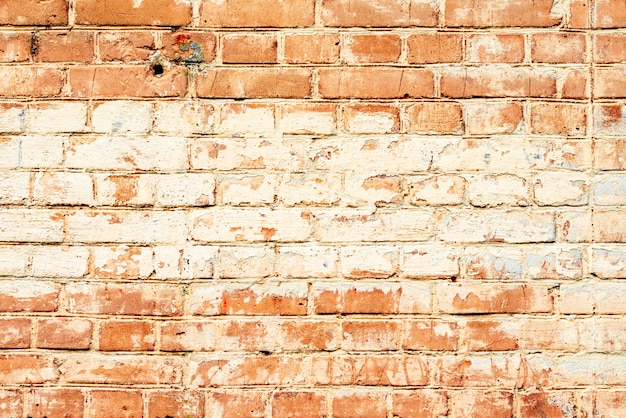 Texture, brick, wall background. Brick texture with scratches and cracks