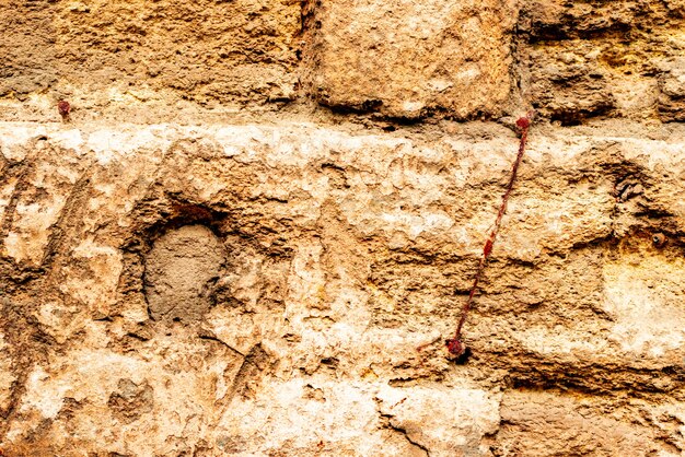 Texture, brick, wall background. Brick texture with scratches and cracks