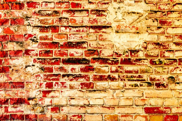 Texture, brick, wall, it can be used as a background. Brick texture with scratches and cracks