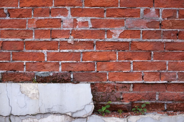 Texture, brick wall with cracks and chips