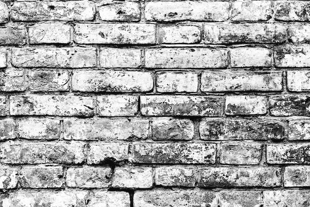 Texture of a brick wall with cracks and scratches which can be used as a background