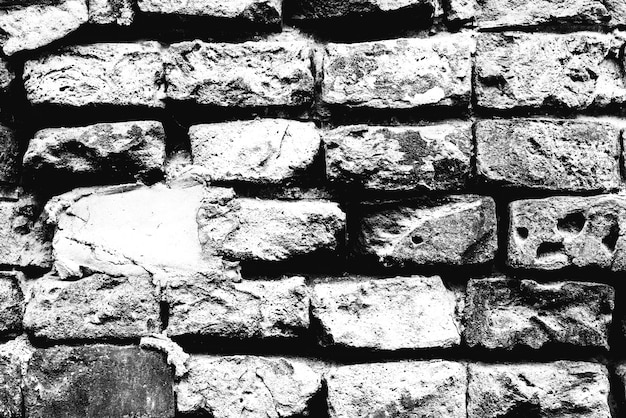 Texture of a brick wall with cracks and scratches which can be used as a background