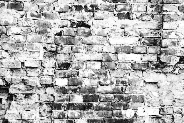 Texture of a brick wall with cracks and scratches which can be used as a background