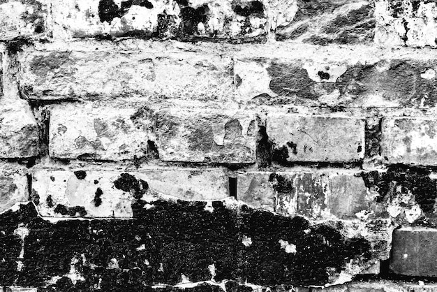 Texture of a brick wall with cracks and scratches which can be used as a background