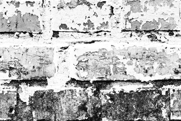 Texture of a brick wall with cracks and scratches which can be used as a background