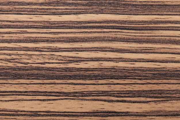 Texture of brown wooden with black striped pattern