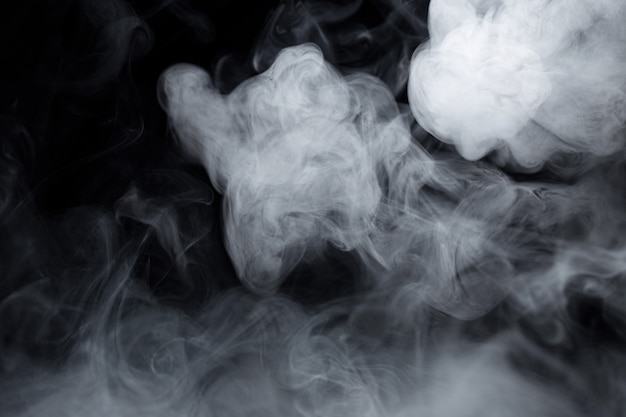 Texture of cigarette white smoke on black