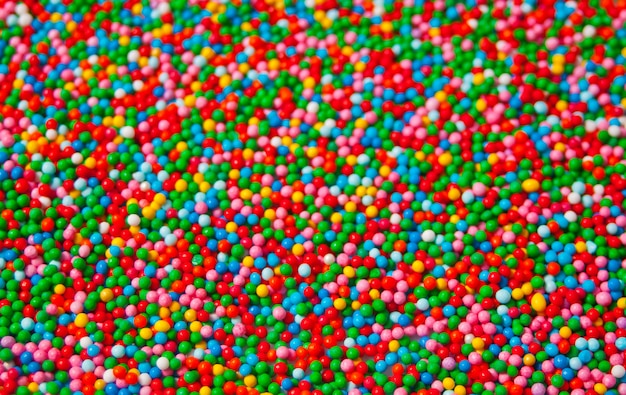 Photo texture of colorful candy sweet small beads