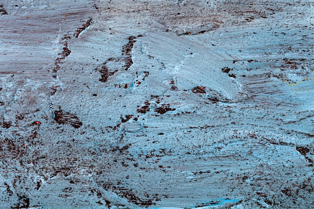 Foto consistenza del muro di cemento. colori blu e neri. texture di sfondi.