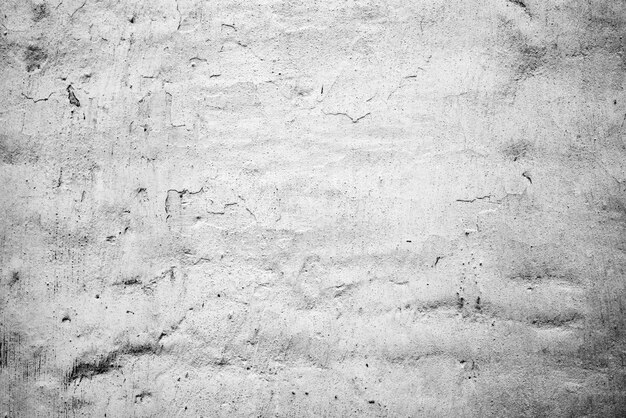 Texture of a concrete wall with cracks and scratches background