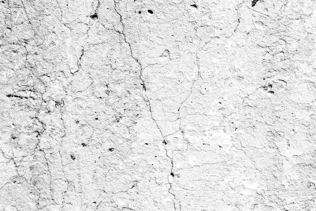 Texture of a concrete wall with cracks and scratches which can be used as a background