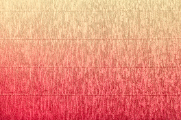 Texture of corrugated red and yellow paper with gradient