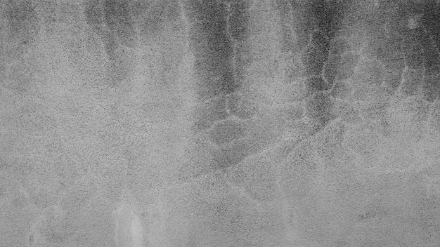 亀裂灰色のセメント壁のテクスチャ