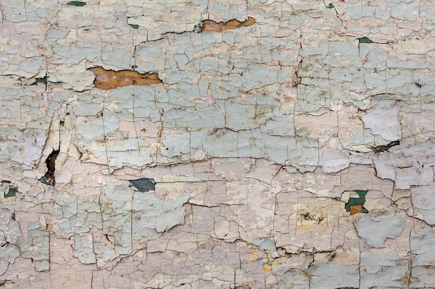 Foto texture di vernice incrinata su una vecchia tavola