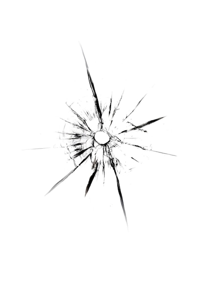 Texture of cracks from a shot broken glass with a hole on a white background