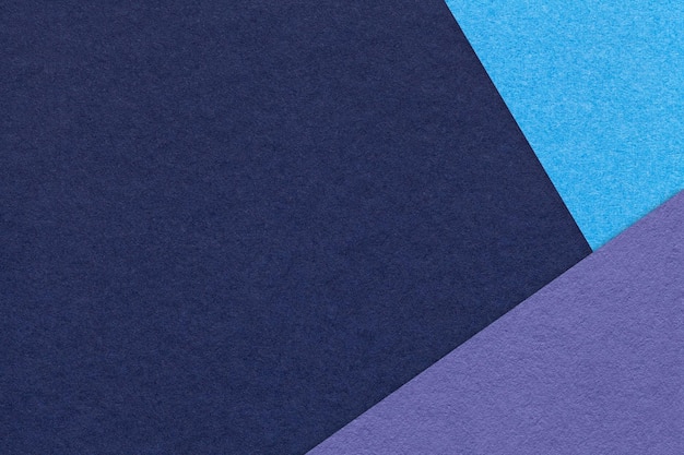 Texture di sfondo di carta di colore blu navy artigianale con bordo turchese e viola cartone astratto vintage