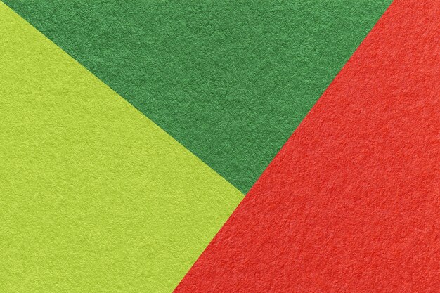 Texture of craft red green and olive shade color paper background macro Vintage abstract cardboard