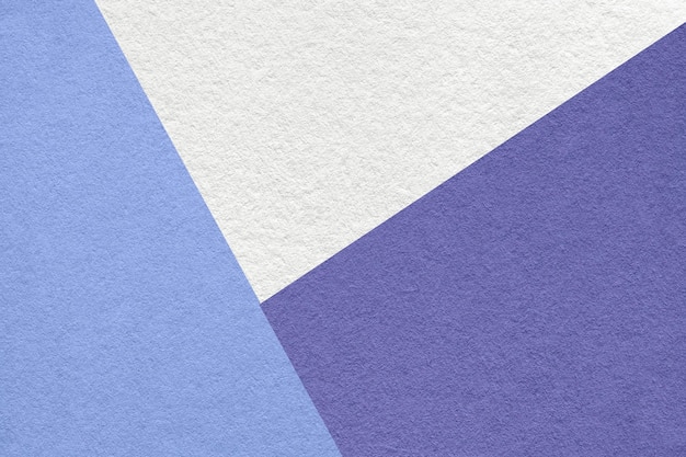 Texture of craft white blue and violet shade color paper background macro Abstract very peri cardboard