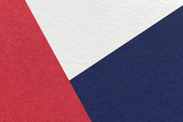 Texture of craft white red and navy blue shade color paper background macro Abstract cardboard with geometric shape