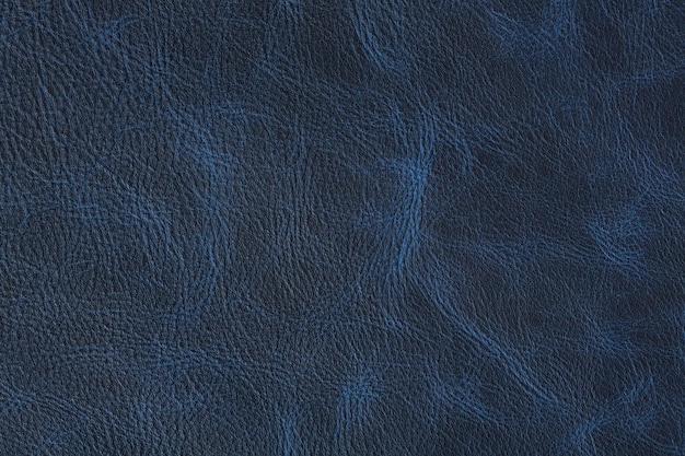 Texture of dark blue vintage leather on macro