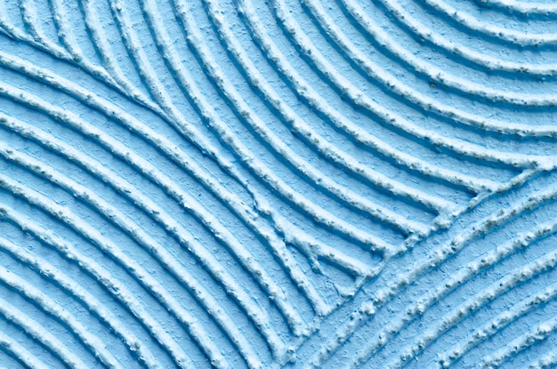 Texture of decorative rough blue putty