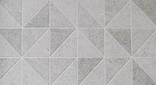 Texture of decorative tiles forming triangles