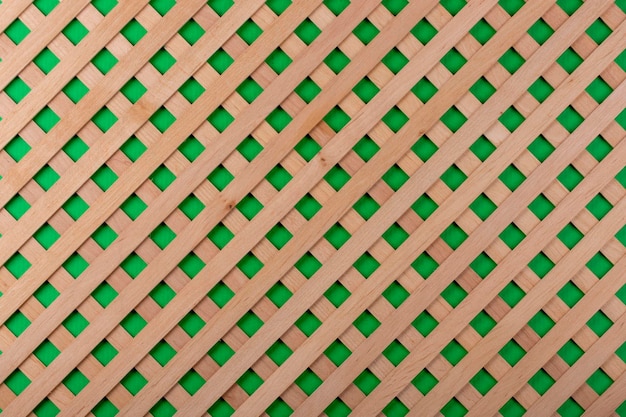 Texture of decorative wooden lattice with colored background