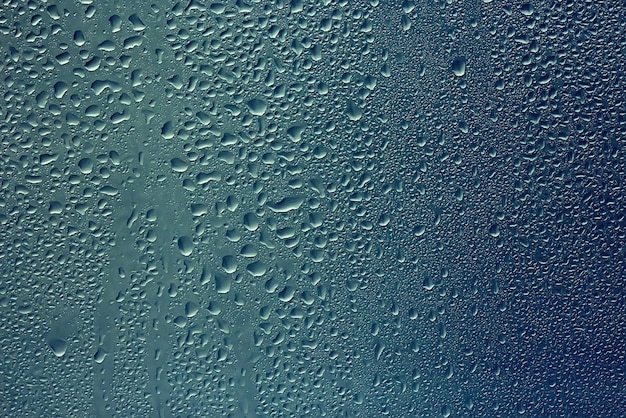 texture of a drop of rain on a glass wet transparent background