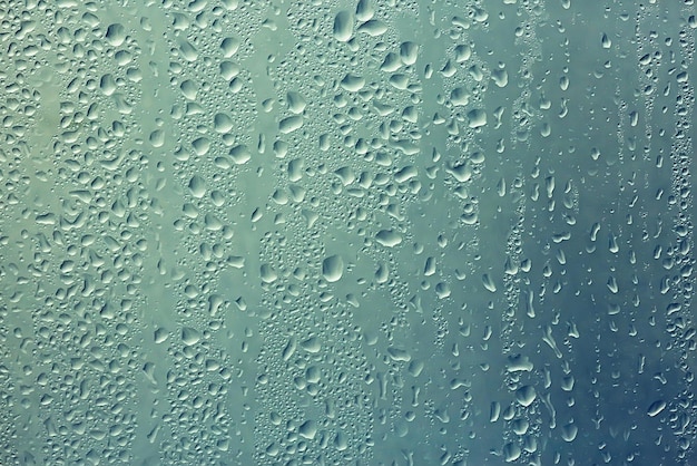 texture of a drop of rain on a glass wet transparent background