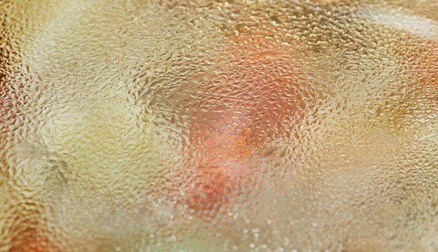 Texture of drops on glass cover with selective focus background