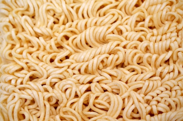 Texture of dry chinese instant noodles close up