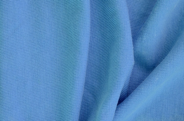 The texture of the fabric in blue background