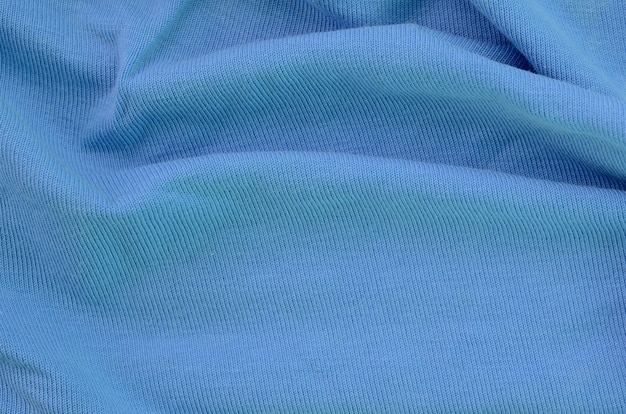 The texture of the fabric in blue background