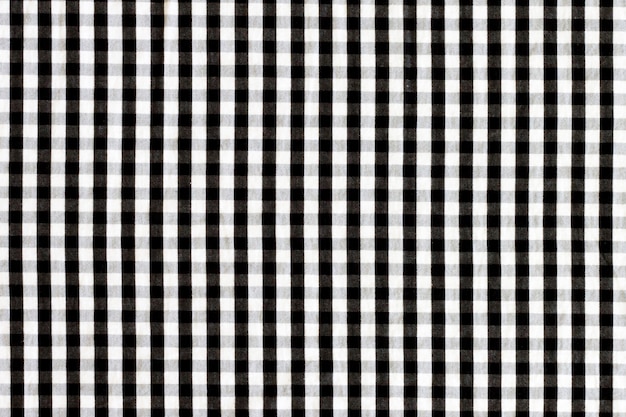 Texture of fabric in a cage. Black and white checked fabric. 