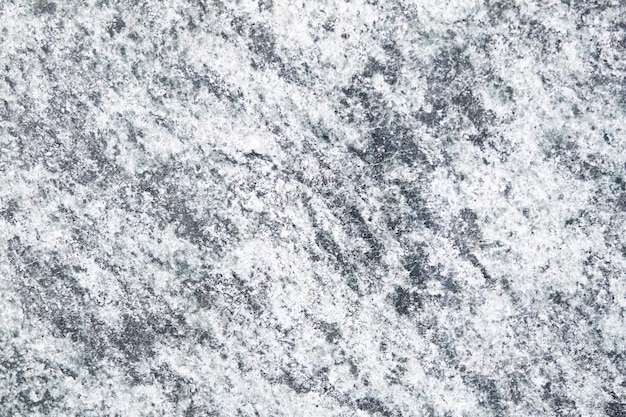 Texture of gray granite stone black and white wall background