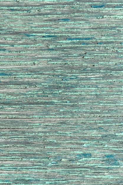Texture of green wooden panel with scuffs on paint background\
and pattern for design and decoration