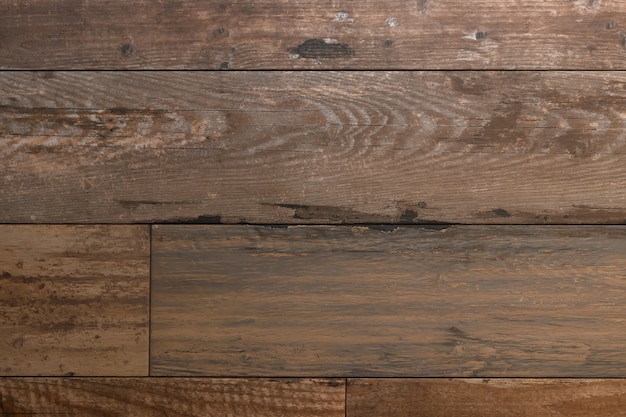 The texture is a wooden brown floor. 