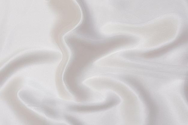 Texture of ivory silk fabric Background pattern