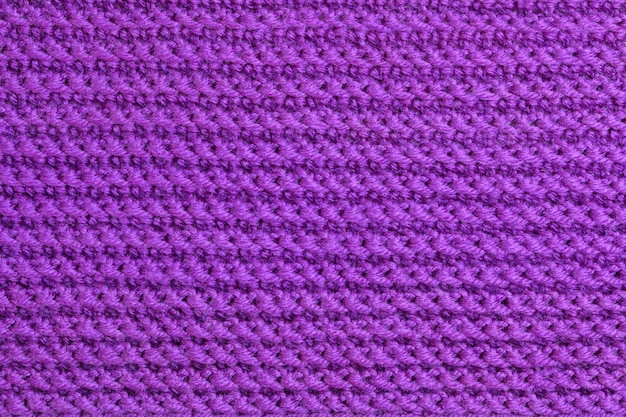 Texture of knitted wool textile velvet violet