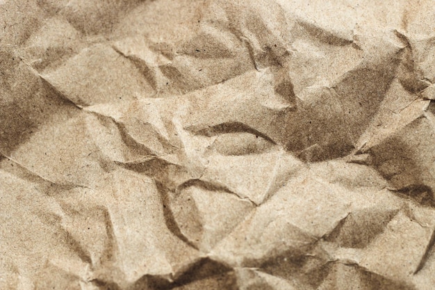 Texture of kraft eco paper from recycling Close up of a cardboard surface