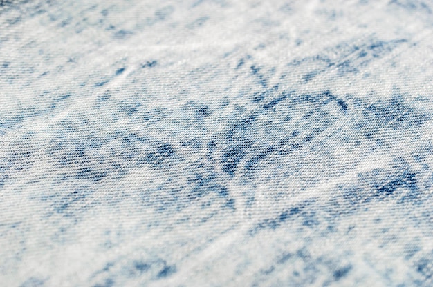 Texture of light blue jeans Close up Abstract background