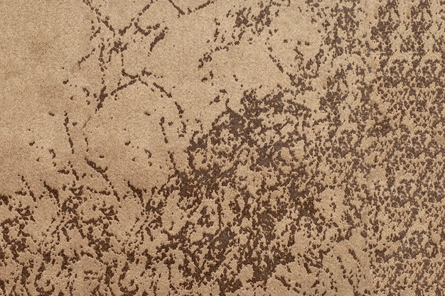 Texture of light brown suede fabric